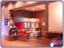 Inside the pumphouse: large screen on wall